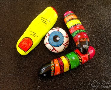 Stones painted with fluorescent paints of halloween